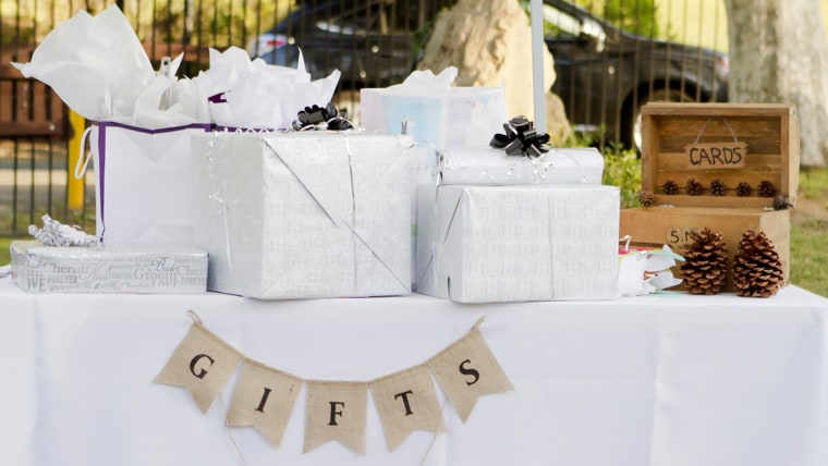 Several gifts wrapped and on a table