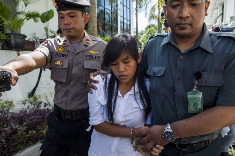 Image: File photo of Mary Jane Fiesta Veloso of the Philippines arriving at her first judicial review trial in the District Court of Sleman inYogyakarta