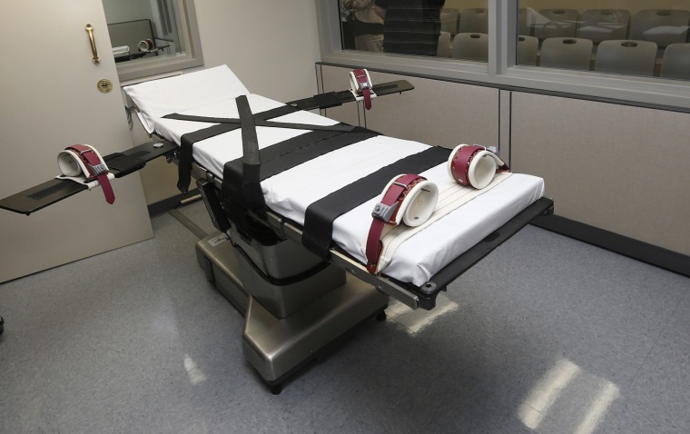 This Oct. 9, 2014 file photo shows the gurney in the the execution chamber at the Oklahoma State Penitentiary in McAlester, Okla.