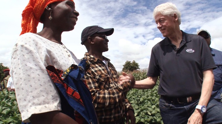 Former President Bill Clinton tours projects in Africa.
