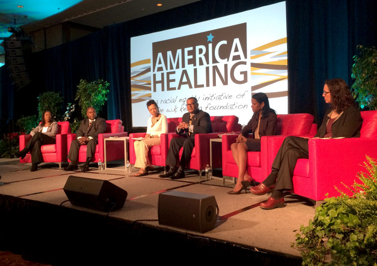 Panelists at the W.K. Kellogg Foundation’s America Healing conference held May 4-7, 2015 in Asheville, NC discuss the turmoil in Baltimore following the death of Freddie Gray in a panel titled “Healing Relationships between Law Enforcement and Communities of Color”. The panel is part of a week-long conference that gathers people working on racial inequities and improving the lives of children of color in communities around the country to discuss healing America’s racial lesions. Pictured are (l to r) Sherrilyn Ifill, president NAACP Legal Defense and Educational Fund; Joseph Scantlebury, vice president for program strategy, W.K. Kellogg Foundation; Mary Curtis, journalist; Jeffrey Blackwell, police chief, Cincinnati Police Department; Melanca Clark, chief of staff, COPS, US Department of Justice and Rachel Godsil, director of research, Perception Institute.