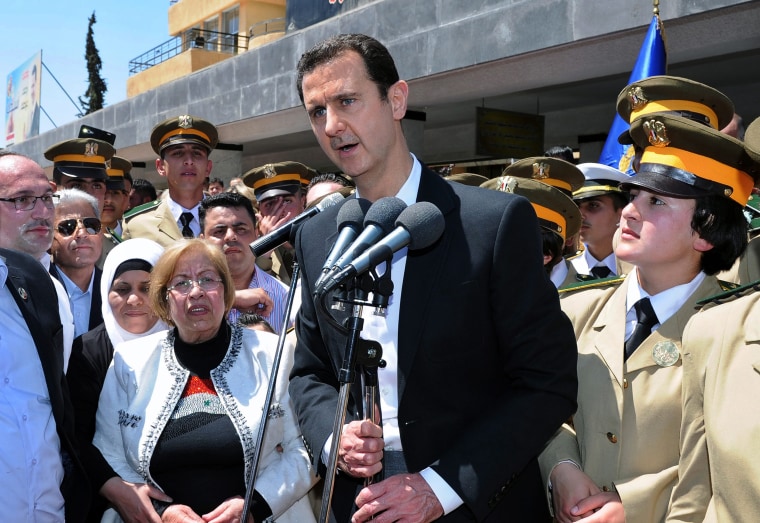 Image: Syrian President admits set backs but vows to reinforce troops