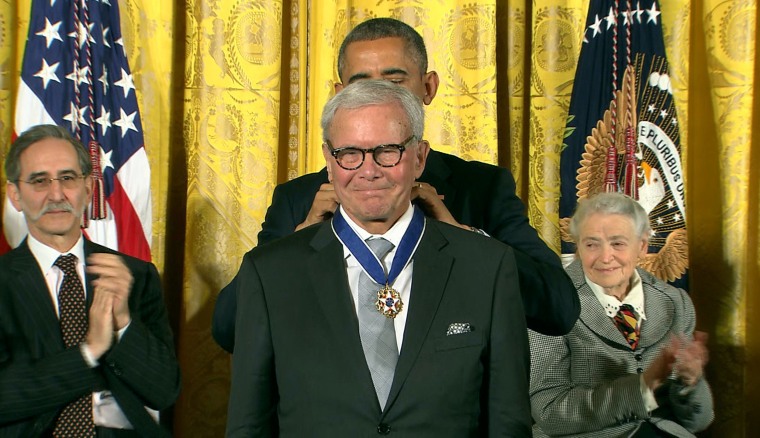 Receiving the Presidential Medal of Freedom from President Barack Obama in 2014.