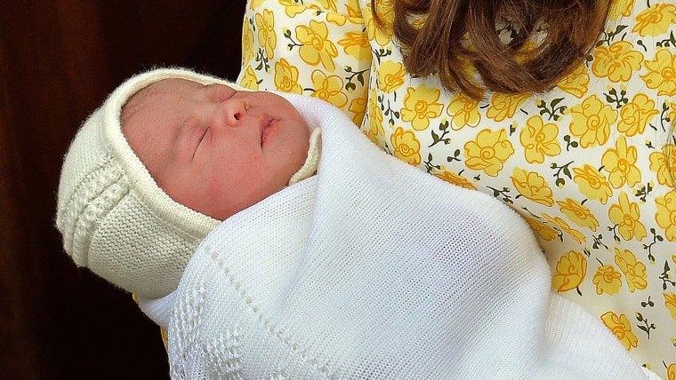 Duchess of Cambridge holds her newly-born daughter