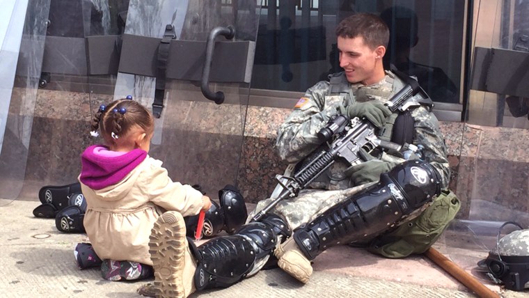 Young girl and a National Guardsman