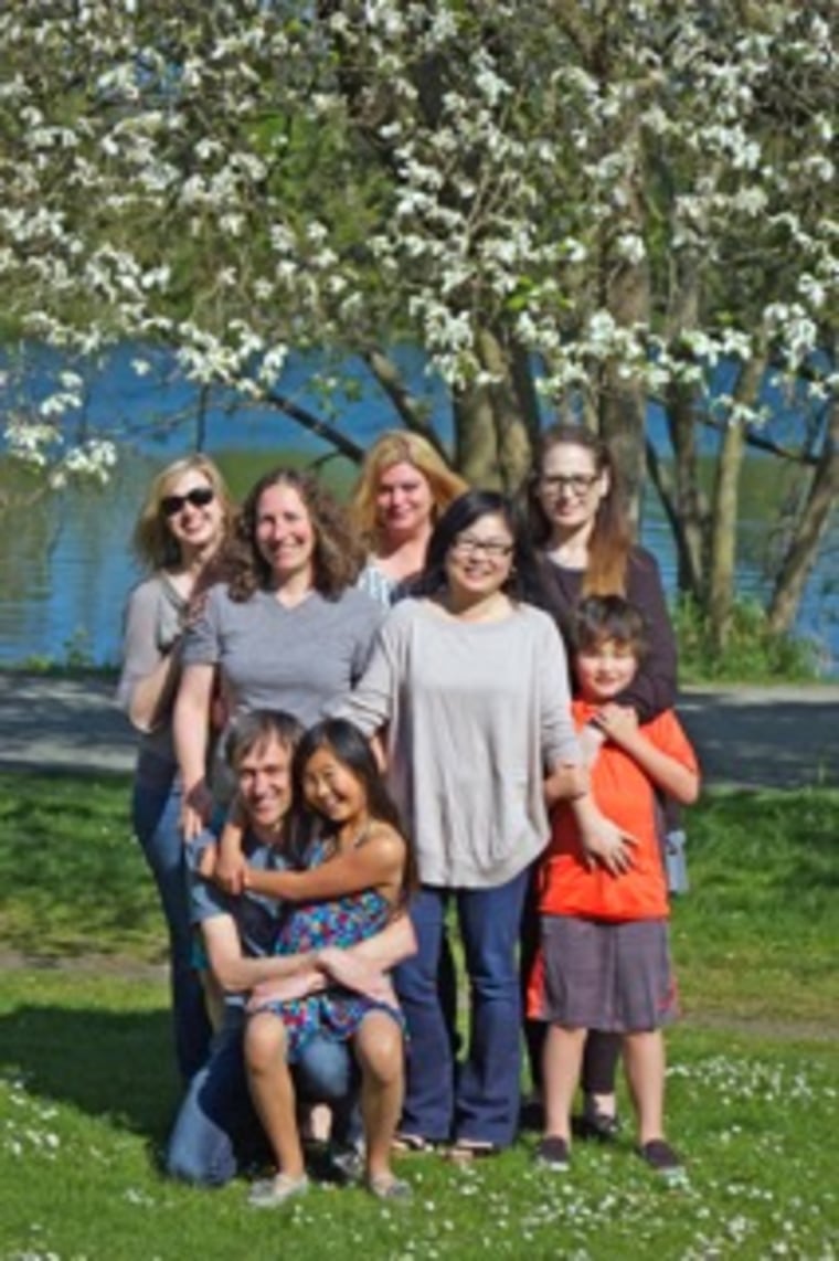 The family that she created: Willem van der Hoeven and his daughter, Adriana (bottom left), with some of their family and family of friends. From left to right: Linda Dahlstrom Anderson, Jen Swanson, Nicole Johnson, Esther Park (Sandra's sister), Denise Patrick (Sandra's sister-in-law) and Isaac Kim (Sandra's nephew).