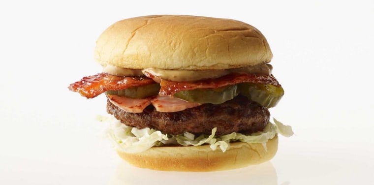 Uncle Sam's 888 burger features a shumai (pork dumpling) patty, ham, char-siu bacon, and sriracha mayo.