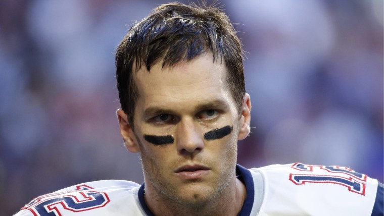 Image: New England Patriots quarterback Tom Brady warms-up ahead of the start of the NFL Super Bowl XLIX football game against the Seattle Seahawks in Glendale