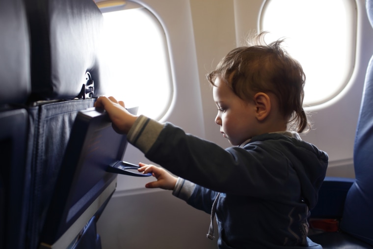 little child at an airplane