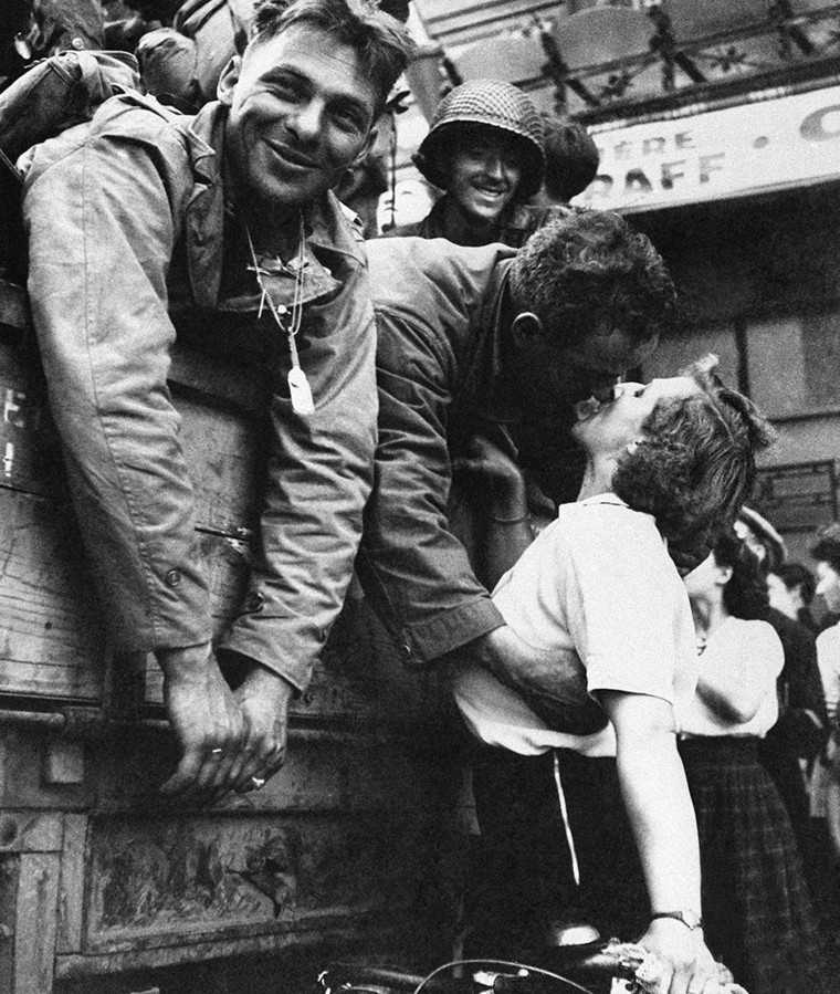 A Parisian woman gives an American soldier a kiss during the Liberation of the French capital on Aug. 25, 1944.