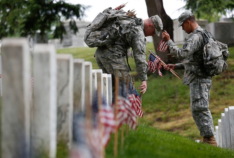 Image: Soldiers Of The 3rd U.S. Infantry Regiment Hosts Annual Flags-In Ceremony At Arlington Cemetery