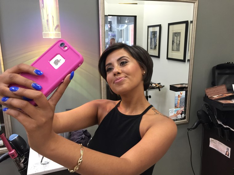 Genesis Perozo snaps a selfie after her salon session.