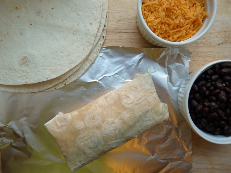 Freezer breakfast burrito on foil