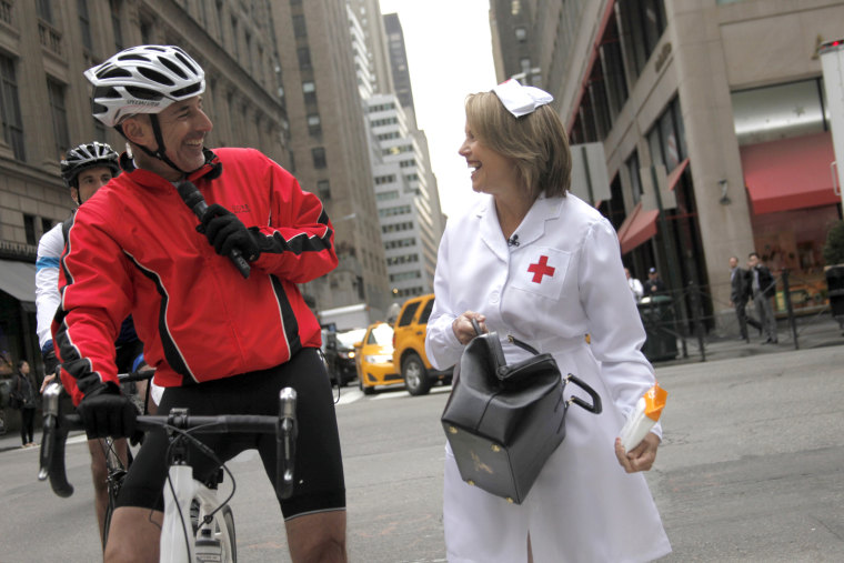 Katie Couric surprises Matt Lauer on the last leg of his Red Nose bike tour