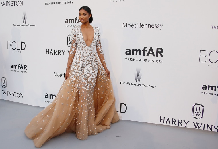 US model Chanel Iman poses as she arrives for the amfAR 22st Annual Cinema Against AIDS during the 68th Cannes Film Festival at Hotel du Cap-Eden-Roc in Cap d'Antibes, southern France, on May 21, 2015.