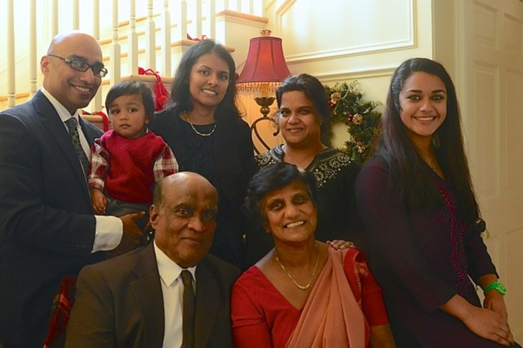 Thomas Mathew and his family for a group picture.
