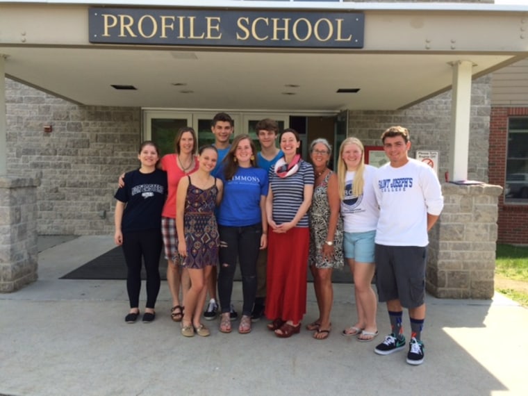 Courtney Vashaw, in red, shown with some of the members of the senior class of Profile Junior-Senior High School in Bethlehem, New Hampshire.  The class voted to skip their senior trip and donate their entire treasury of about $8,000 to help Vashaw fight a rare type of cancer.