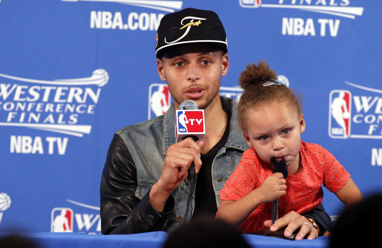 Stephen Curry and his daughter at the press conference following the Golden State Warriors win