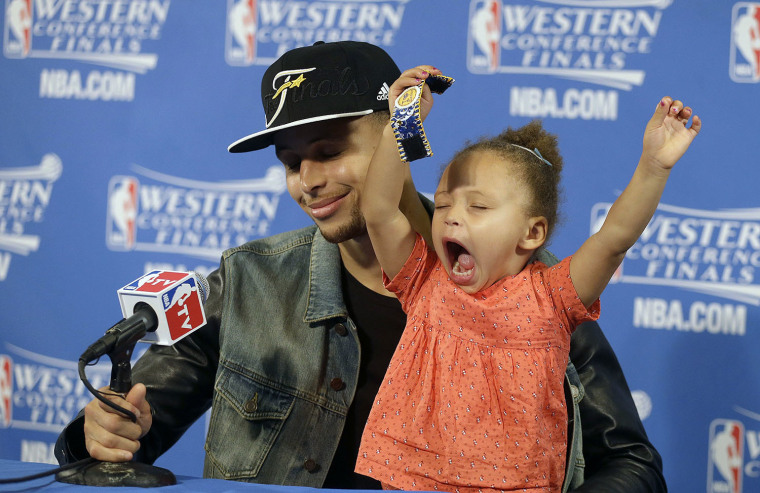 Stephen Curry and his daughter at the press conference following the Golden State Warriors win