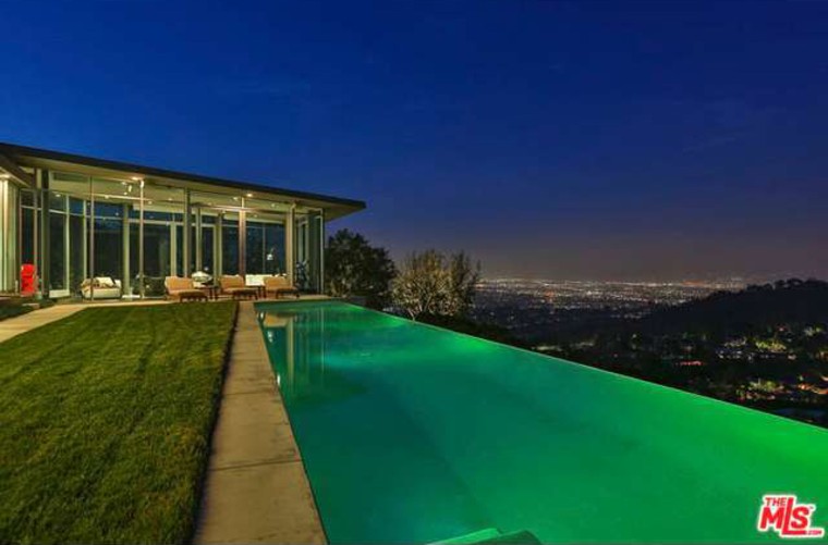 Pharrell Williams Sells Ultramodern Glass Mansion