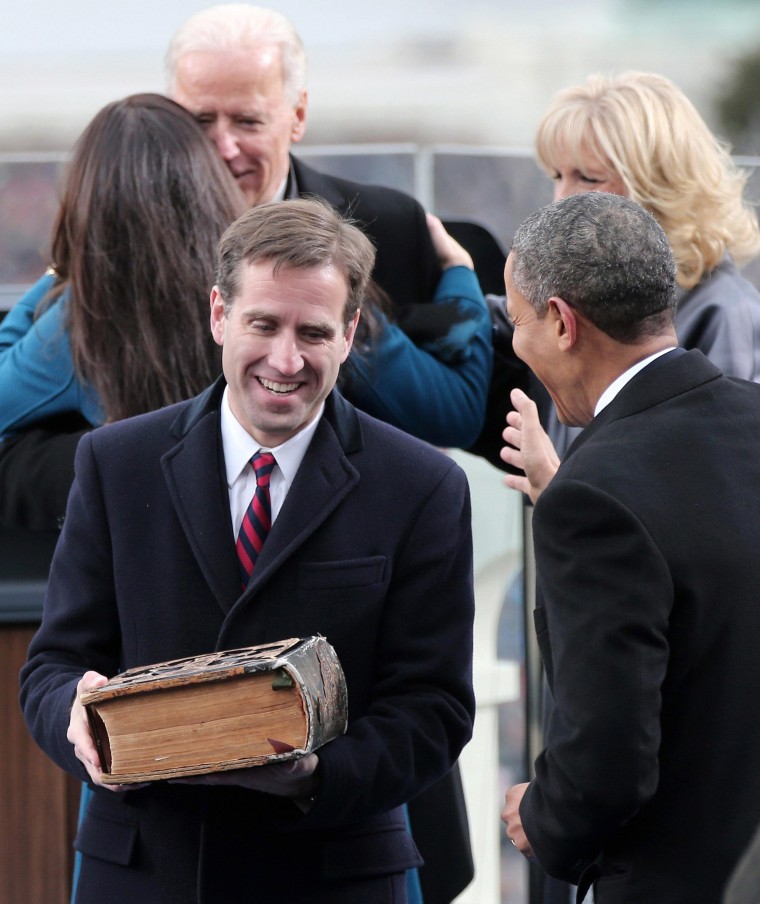 Image: File photo of Beau Biden, son of Vice President Joe Biden, carrying the family bible during the presidential inauguration in Washington