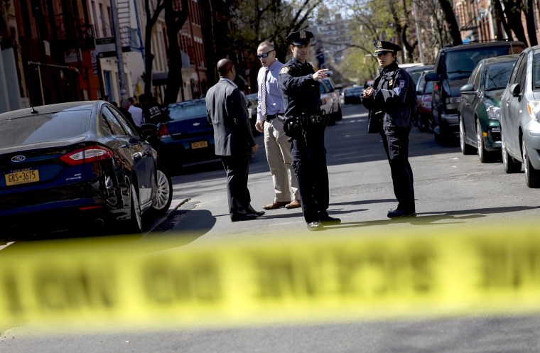 Image: Police are seen near the scene of a shooting in New York City