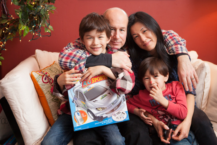 Wang with her husband, Frank, and their sons, Austin and Soren.