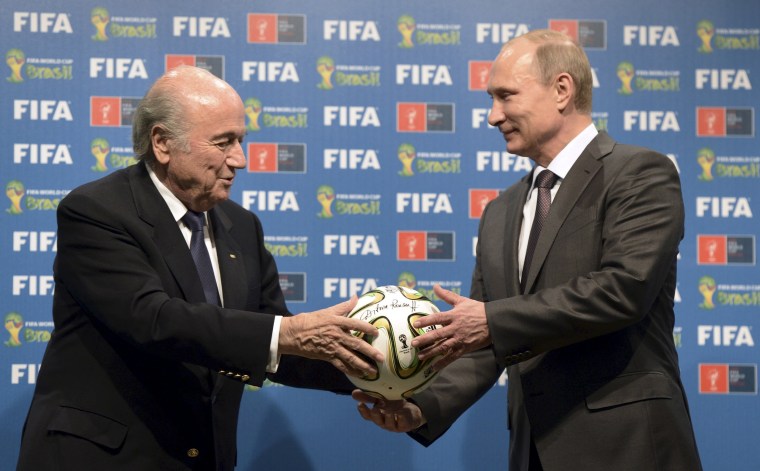 Image: File photo of Russian President Putin and FIFA President Blatter take part in official hand over ceremony for 2018 World Cup in Rio de Janeiro