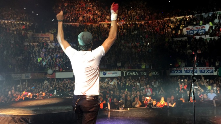 Enrique Iglesias injured his hand after touching a drone during his concert