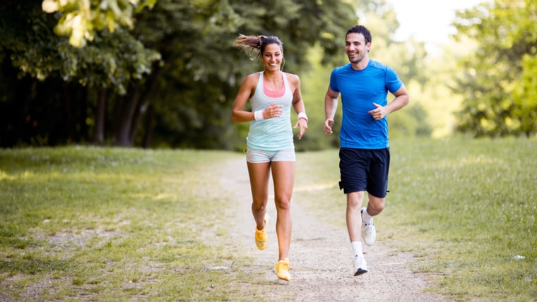 Young couple running;