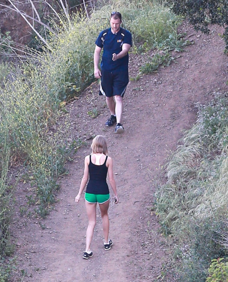Taylor Swift shares a photo of herself hiking backwards