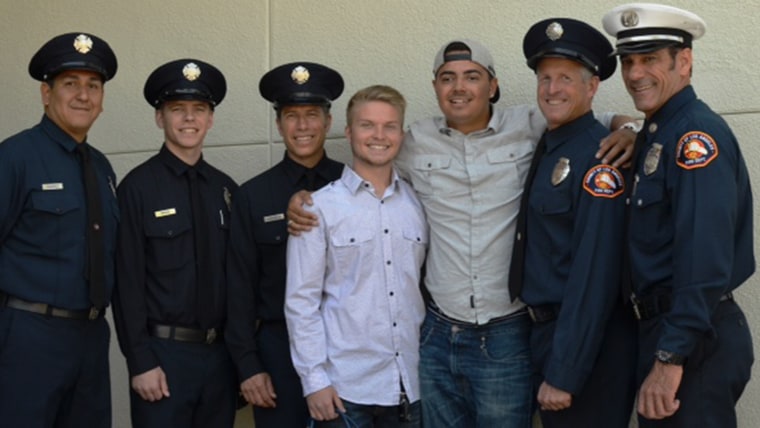 Matt Scalise with paramedics from the Los Angeles County FD and Josh Lucia who who administered CPR until rescuers arrived.