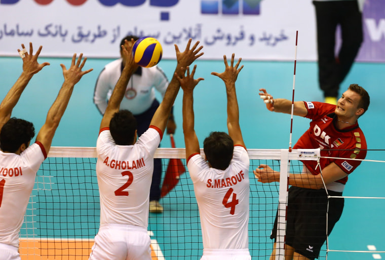 Image: Iran plays a Volleyball World League match against Germany in Tehran on July 12, 2013