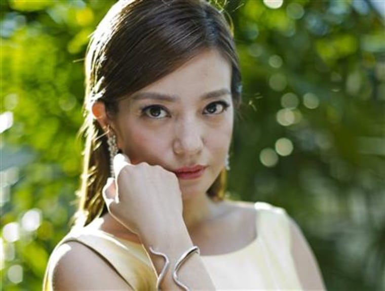 In this photo taken Thursday, Aug. 28, 2014, Chinese actress Zhao Wei poses for portraits during the 71st edition of the Venice Film Festival in Venice, Italy. New rules enacted May 1, 2015 making it easier to file lawsuits in China have led to a new