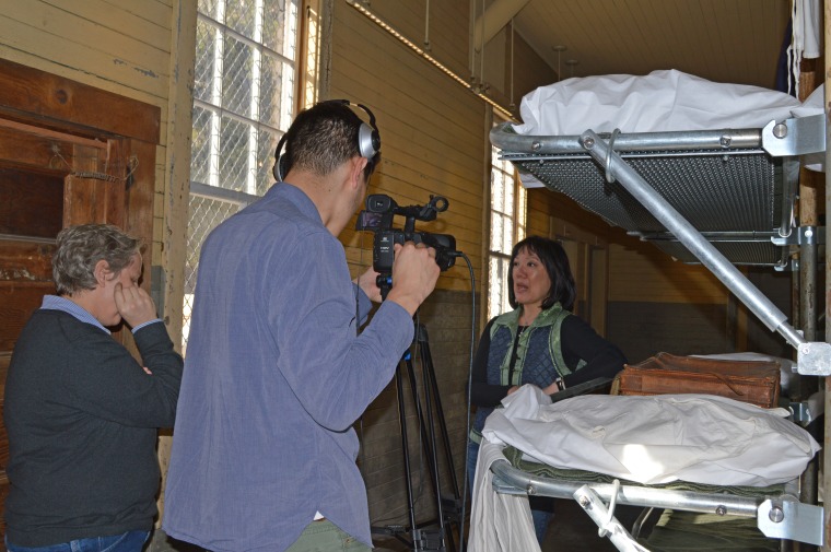 Anne Galisky (director) and Roland Dahwen Wu (cinematographer) interview Julie D. Soo while filming on location at Angel Island Immigration Station.