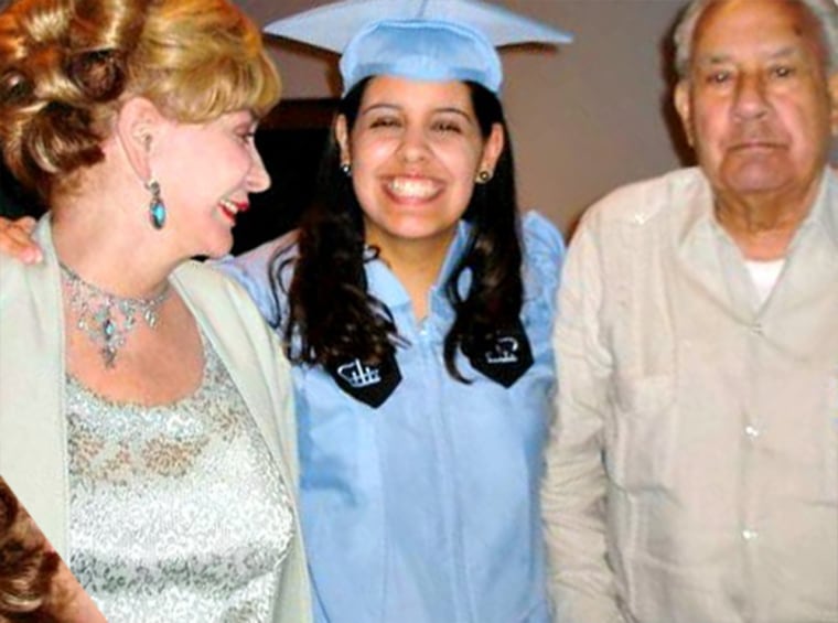 Carmen Cusido with her parents after graduating from Columbia Journalism School in May 2010.