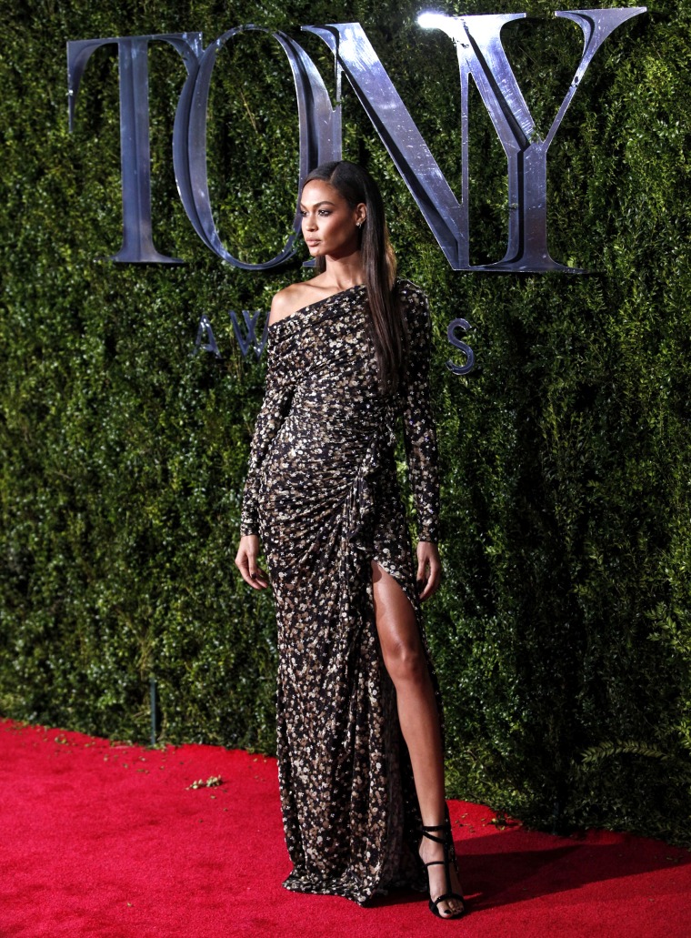 Fashion model Joan Smalls poses on arrival for the 69th Annual Tony Awards