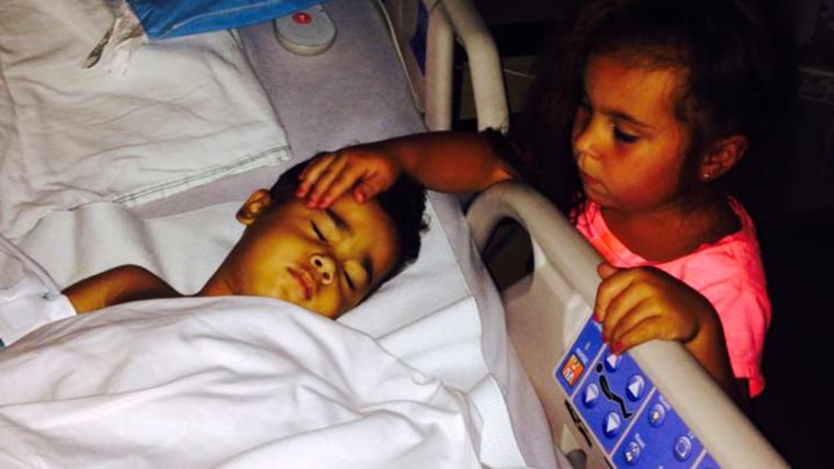 Johanna Colon, 6, with her little brother CJ, who has a rare disease