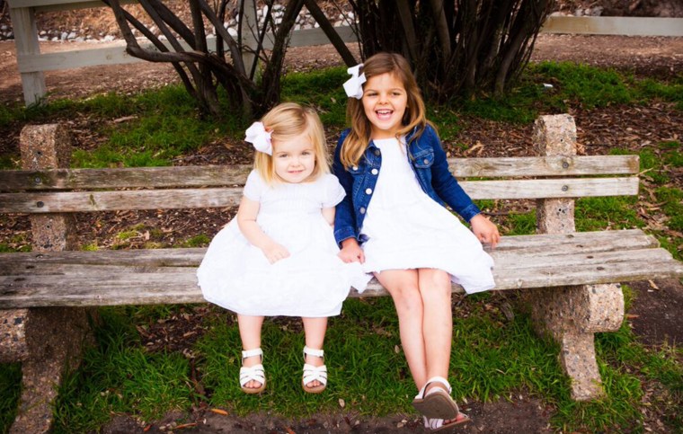 Charlotte Gray, 4, and her 2-year-old sister Gwenyth, who both live with a rare brain condition called Batten disease