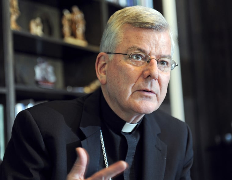 Archbishop John Nienstedt talks with a reporter at his office in St. Paul, Minn. Wednesday, July 30, 2014.