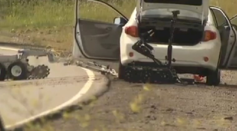 IMAGE: Bomb squad detonates device after bank robbery