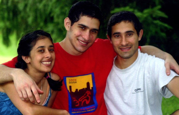 A picture of Sangeeta Tripathi, Sunil Tripathi, and Ravi Tripathi (left to right).