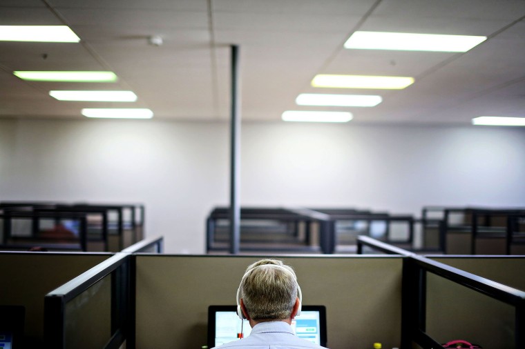 Image: A man works at a call center