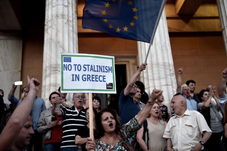 Image: A protester during a pro-European demonstration in front of the Greek parliament in Athens.