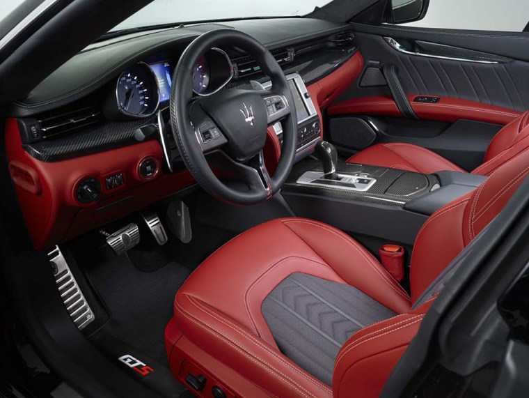 A Maserati Quattroporte with a Zegna silk interior.