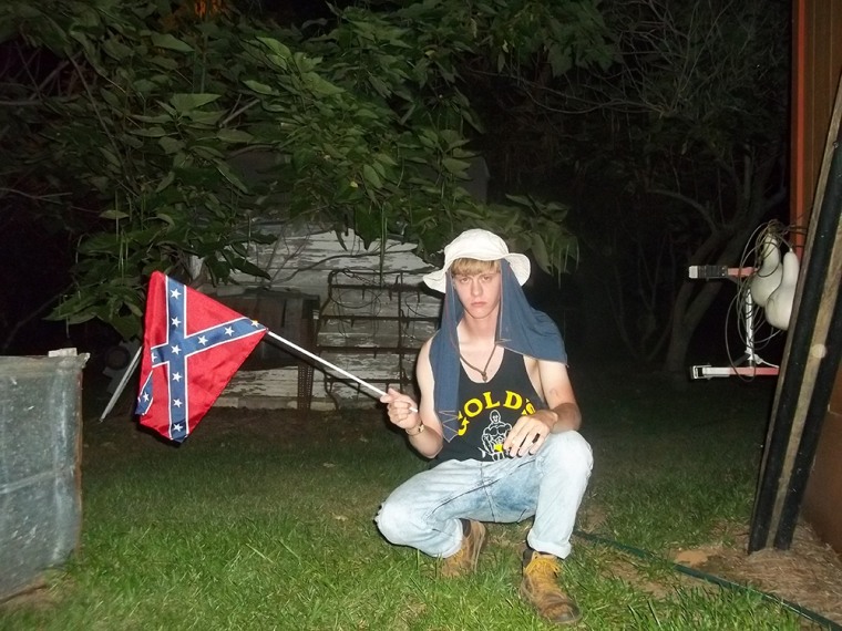 Dylann Storm poses with the Confederate flag in a photo that appears to have been posted by Roof to a website.