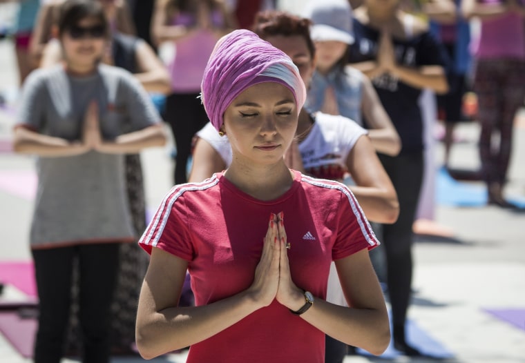 Image: Participants mark the International Day of Yoga in Almaty
