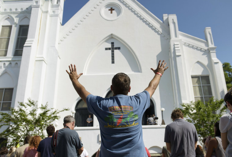 Image: People listen to the Sunday service outside the Emanuel AME Church