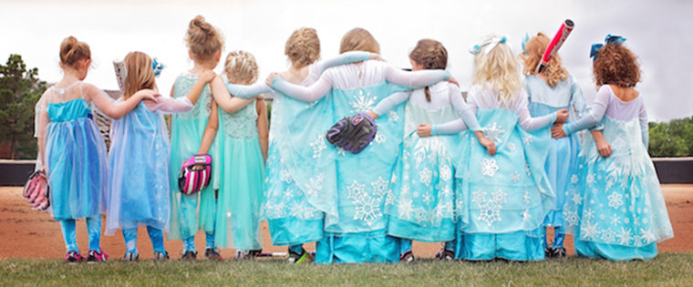 Tee ball team takes team photo in Elsa dresses