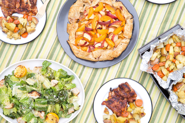 Grill a whole meal: BBQ Chicken Thighs; Grilled Fruit Tart; Roasted Root Vegetable Packets; Grilled Caesar Salad